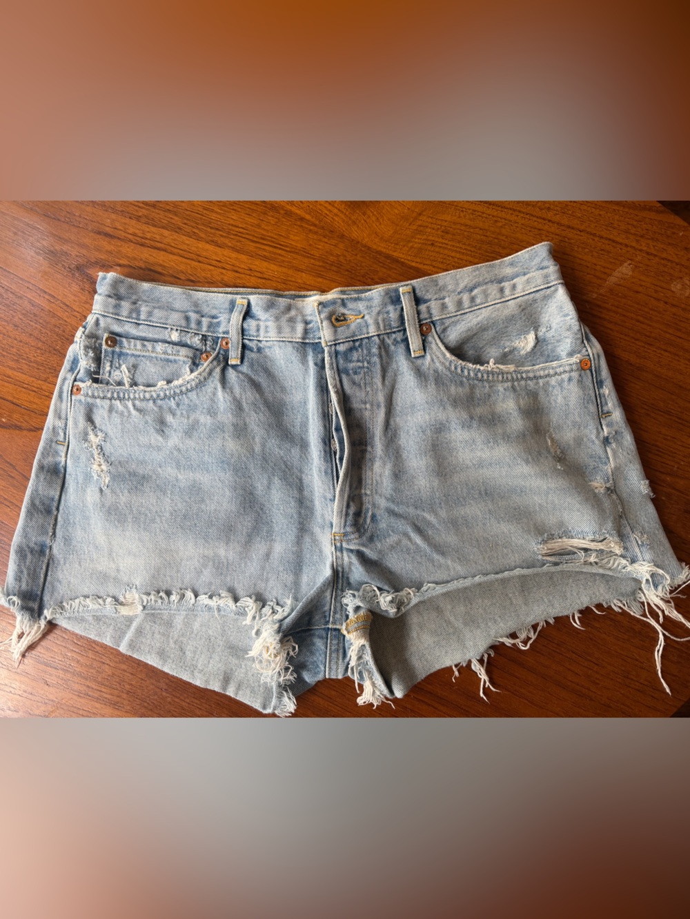 Agolde Light Blue Distressed Denim Cutoff Shorts